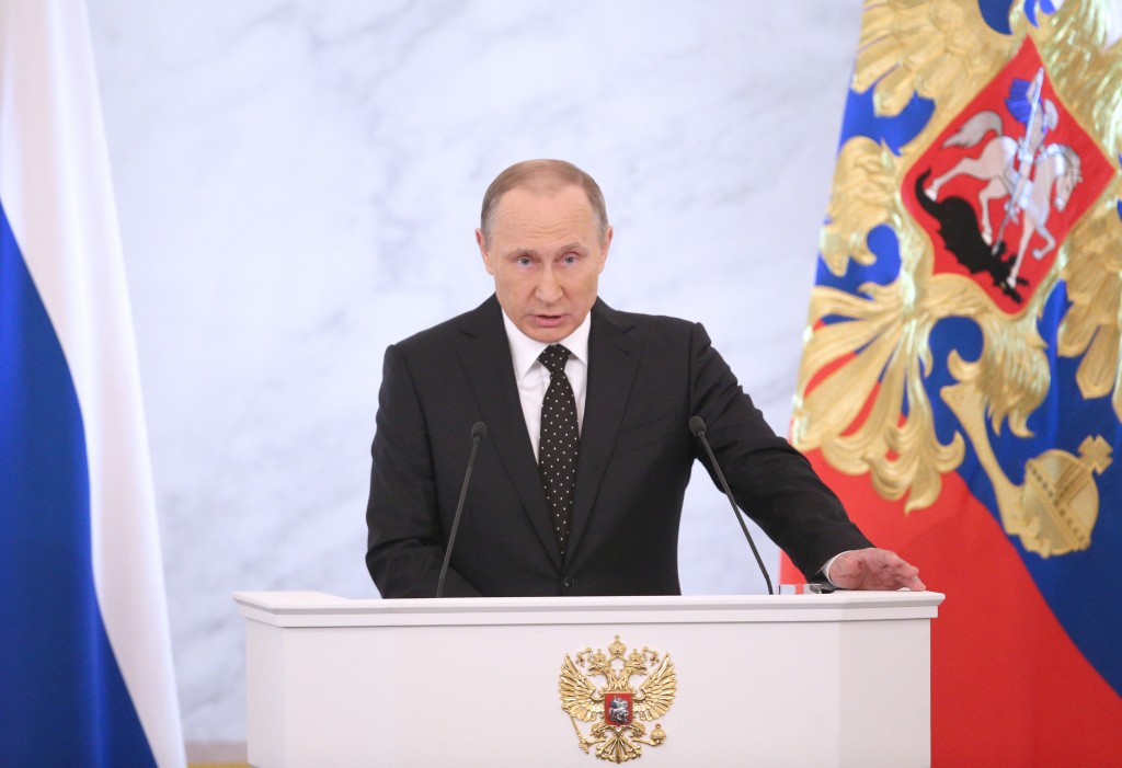 MOSCOW, RUSSIA. DECEMBER 3, 2015. Russia's President Vladimir Putin delivers his annual address to the Federal Assembly, at the Moscow Kremlin. Sergei Bobylev/TASS Ðîññèÿ. Ìîñêâà. 3 äåêàáðÿ 2015. Ïðåçèäåíò Ðîññèè Âëàäèìèð Ïóòèí âî âðåìÿ âûñòóïëåíèÿ ñ åæåãîäíûì ïîñëàíèåì ê Ôåäåðàëüíîìó Ñîáðàíèþ ÐÔ â Êðåìëå. Ñåðãåé Áîáûëåâ/ÒÀÑÑ